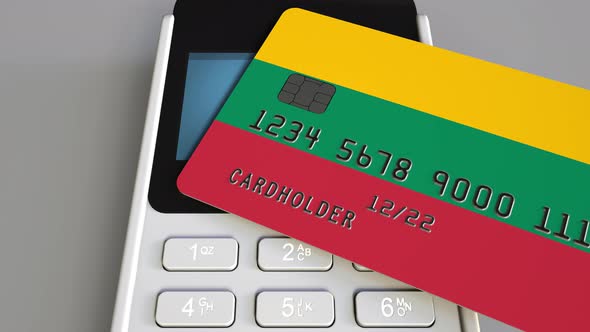 Bank Card with Flag of Lithuania and POS Terminal alt