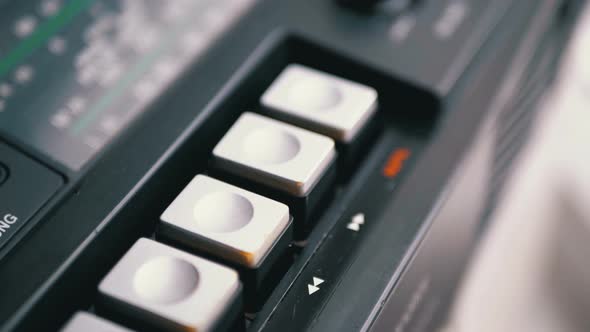 Playback Control Buttons on a Retro Radio Receiver