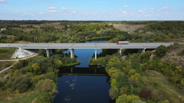 Aerial Shot Of A Bridge Crossing A River. Ukraine