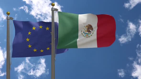 European Union Flag Vs Mexico Flag On Flagpole