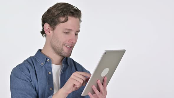 Happy Young Man Using Digital Tablet on White Background