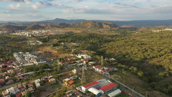 Complex of houses outside the city cerro occidente cloudy sky urban forest