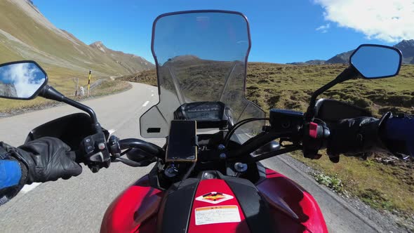 POV Biker Rides on Motorbike By Scenic Mountain Pass in Swiss Alps Moto Trip