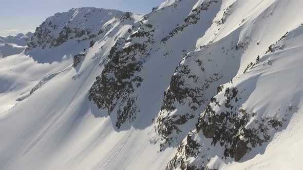 Rocky Snowy Cliff Wall