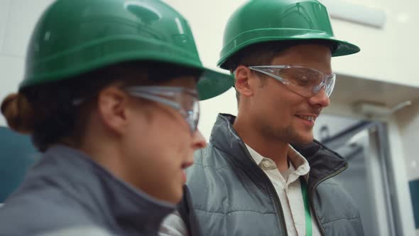 Facility Supervisors Inspecting Manufacture Closeup