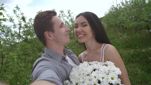 Young Couple in Love Taking Selfie Dating Outdoors