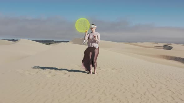 Young Woman with Augmented Reality VR Glasses Looking at Futuristic Earth Planet