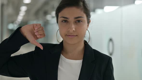 Disappointed Indian Businesswoman Doing Thumbs Down 