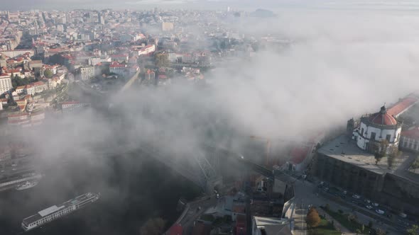 Aerial View of Charismatic Historic Centre Under Foggy Skies