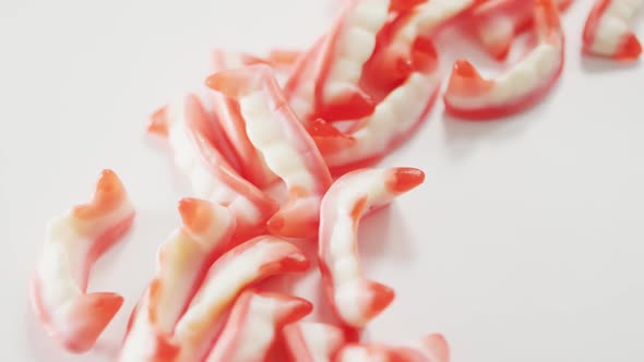 Close up view of halloween sour patch candies fallen against grey background