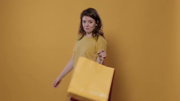 Portrait of Woman Feeling Proud of Purchase Showing Excitement for Buying Products