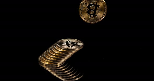 Bitcoins on Black Background, slow motion 4K