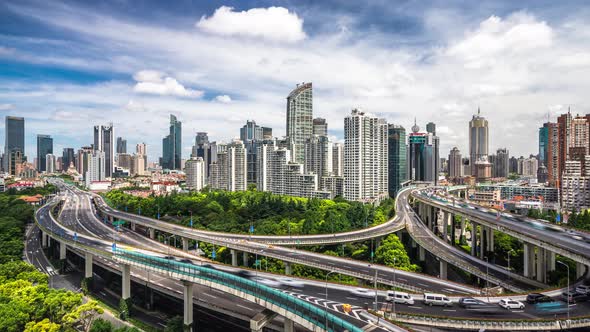 Timelapse of busy traffic road with modern office building in Shanghai china