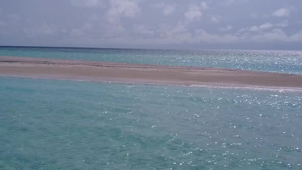 Aerial drone sky of coastline beach by blue lagoon and sand background