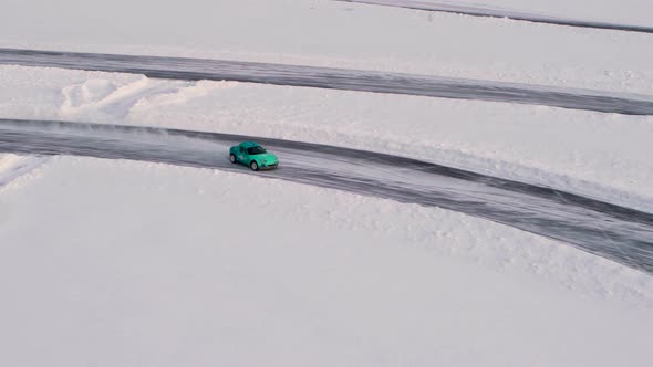 Aerial view of a racing car at an ice rally
