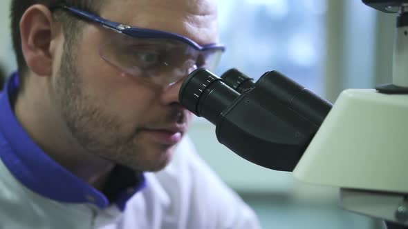 Closeup Male Lab Doctor Chemist Looking Into Microscope Spbd