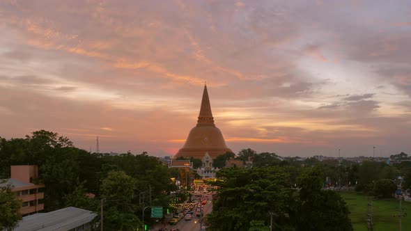 Day to night time lapse of aerial view of Phra Pathom Chedi stupa temple in Nakhon Pathom