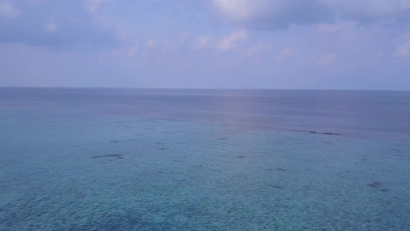 Aerial view tourism of tropical tourist beach wildlife by water with sand background