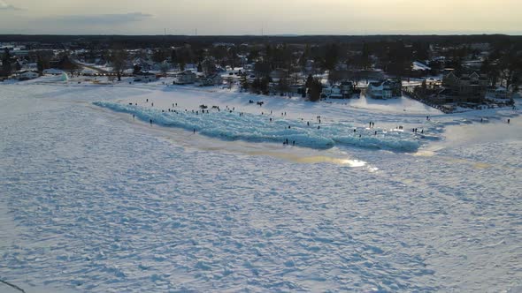 Overhead drone shot of blue ice in the Straits of Mackinac in Mackinaw City, Michigan.