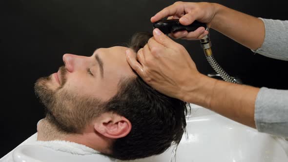 Man getting his hair wash