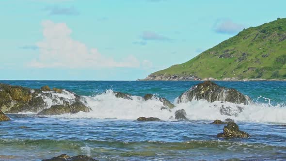 Slow Motion Video Of The Rock Was Washed By The Waves