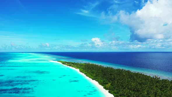 Aerial view nature of tranquil seashore beach holiday by blue sea and white sand background of a day