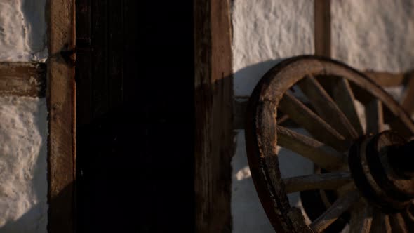 Old Wood Wheel and Black Door at White House