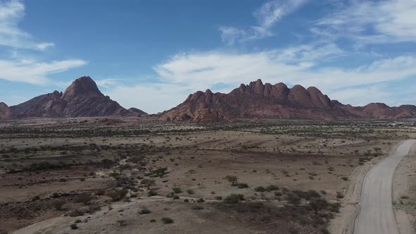 Beautiful nature of Namibia, dry region with some plants and big mountains