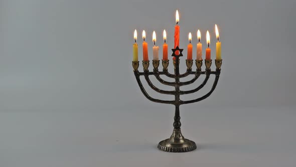 Hanukkah celebration judaism menorah tradition Jewish holiday symbols lighting candles