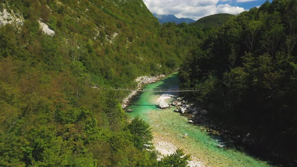 Drone Flight Over Forests From River Soca