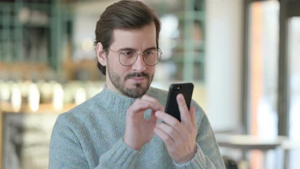 Portrait Young Man Using Smartphone