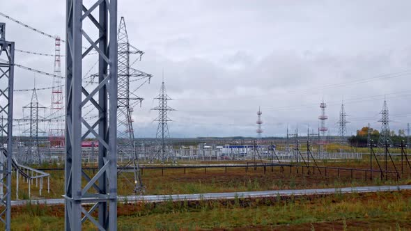 Industrial Timelapse From Above with Dynamic Zoom Effect Power Generation Metal Poles and Towers for