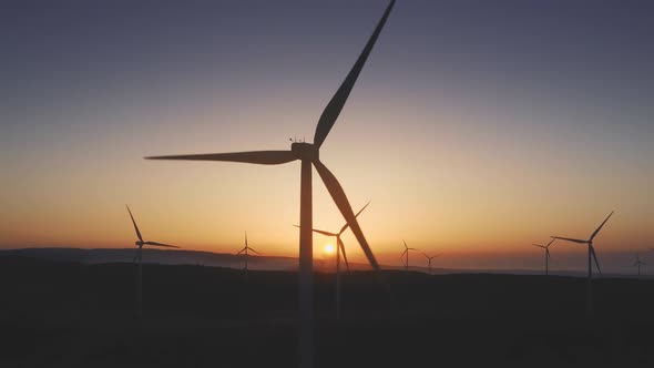 Wind Generator Rotate on Mountain Ridge Closeup