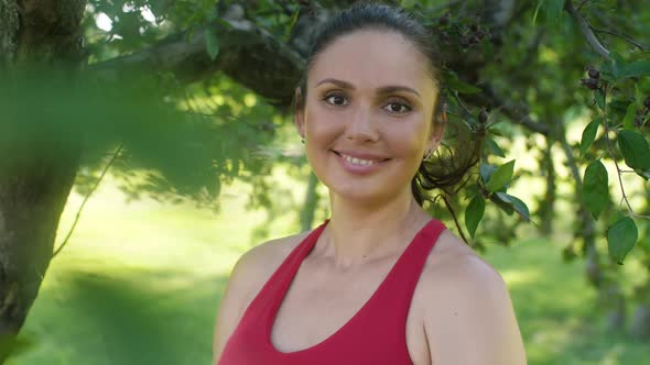 Portrait of a Beautiful Woman on Nature