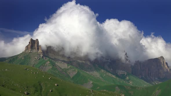 Caucasus Mountains Under Moving Clouds