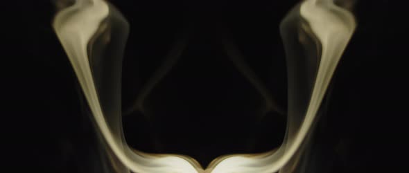 Incense smoke swirling on black background alt