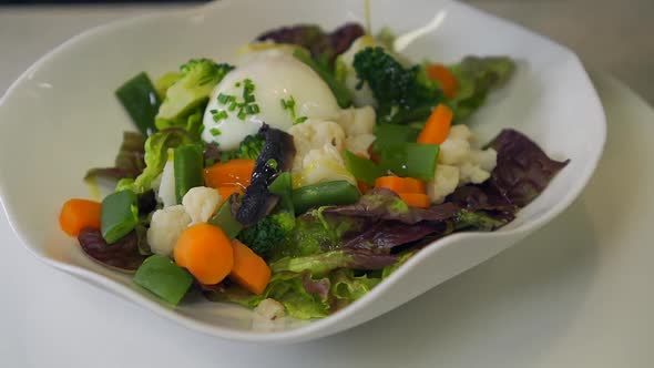 Vegetable stew with poached egg
