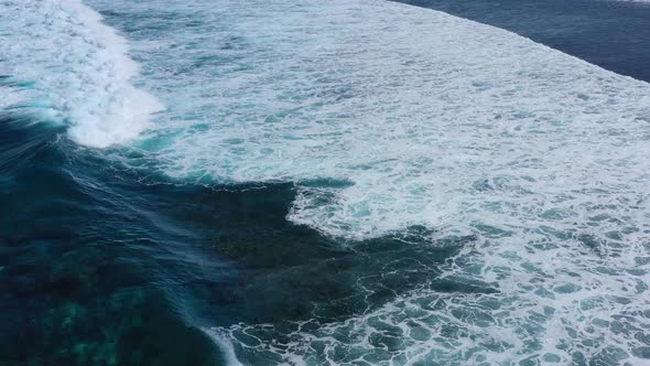 Waves and Azure Water as A Background. View from High Rock at The Ocean Surface. 