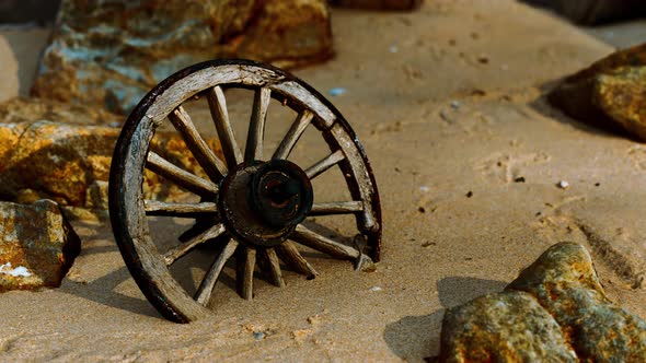 Old Wooden Cart Wheel at Sand Beach