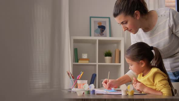 Mother with Little Daughter Drawing at Home