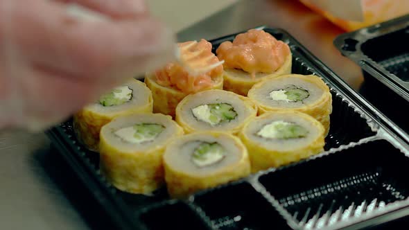 Chef Decorates Creamy Fried Japanese Rolls with an Omelette