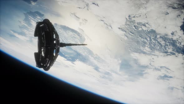Futuristic Space Satellite Orbiting the Earth alt