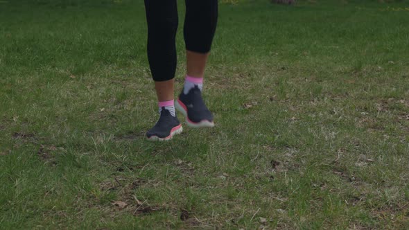 Female Woman Exercising Hula Hoop in Park Warm Day Mature Fitness Health Concept