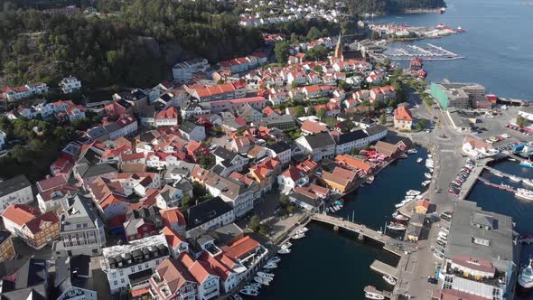 Aerial view of coastal city with residential colony at Kragero, Norway - top drone shot