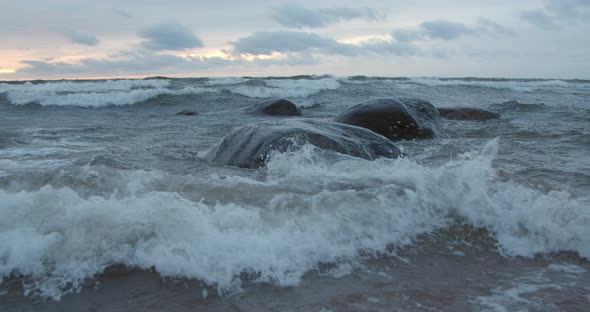 Waves Crashing To Rocks Slow Motion