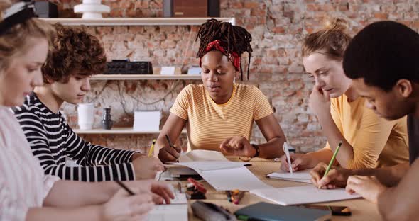 Slow motion shot of students studying in a group