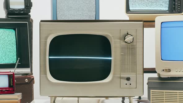 Old Televisions with Grey Interference Screen on Light Background