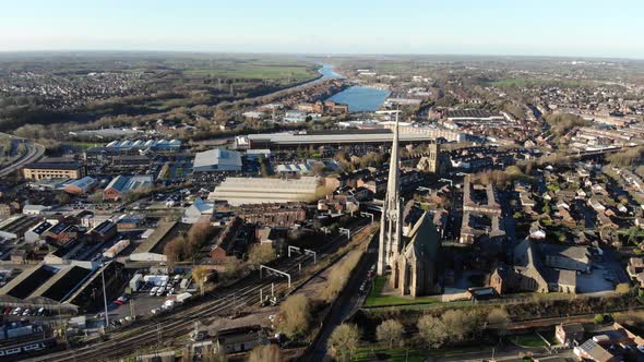 Rotating clockwise in the air around Church of St Walburge, Preston on a winter sunny day