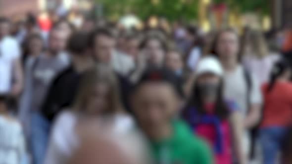 Silhouettes of People Walking in a Crowd Slow Motion