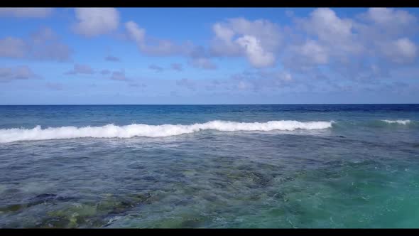 Aerial drone shot nature of exotic coast beach holiday by transparent sea and white sand background 